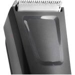 Clean professional electric hair clipper with adjustable blades for grooming.