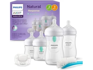 Philips Avent AirFree Vent Baby Bottle Newborn Gift Set - 4 Baby Milk Bottles with Air-Free Vent, Ultra-Soft Pacifier and Bottle Brush, Babies Aged 0-12 Months+ (Model SCD657/11)